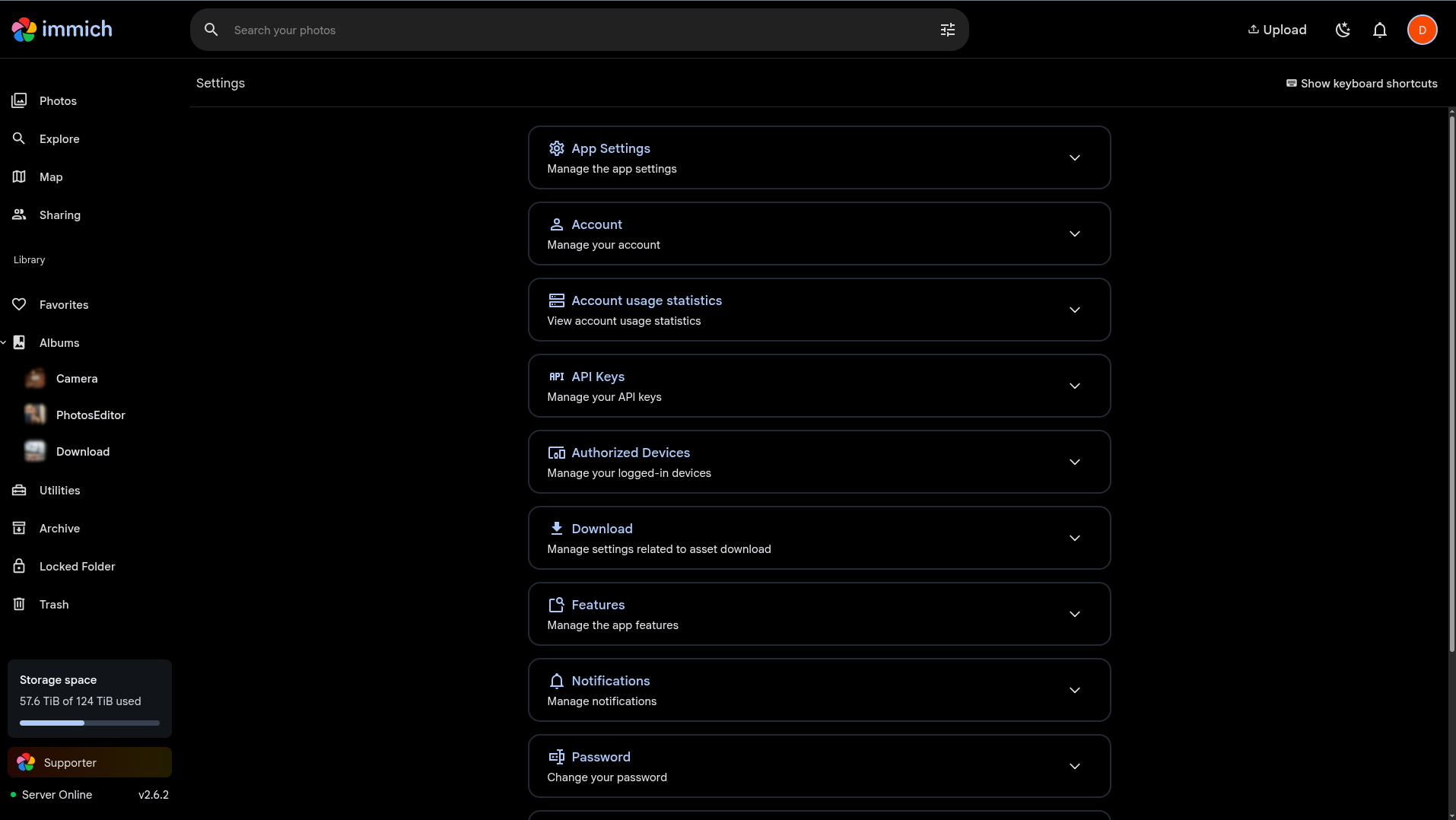 Immich settings page showing the web interface with albums, storage usage, and server status